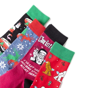 Four pairs of festive Christmas cotton socks featuring Santa, snowman, and reindeer patterns