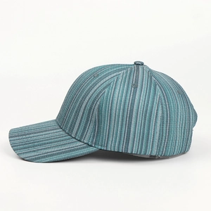 Detail view of the blue and grey striped fabric and breathable eyelets on this baseball cap