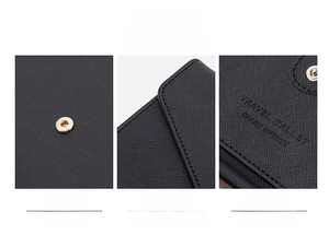 Close-up of black textured leather travel wallet with gold magnetic clasp and fine stitching