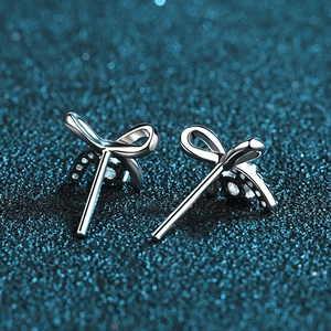 Elegant S925 sterling silver bow knot stud earrings featuring sparkling moissanite accents