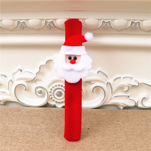 Detail of Christmas Santa plush slap bracelet with red flexible band for kids gifts