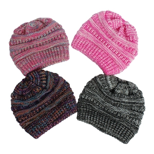 Detail showing knit texture and various color options for winter baby beanies
