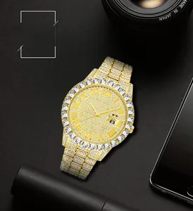 Detail of luxury gold iced-out watch with crystal diamonds and Roman numerals