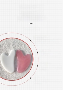 Macro detail of smooth pink heart-shaped resin scraping tool for neck and body massage