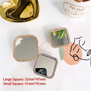 Sparkly rhinestone heart mirror phone stand in gold and silver, size dimensions shown