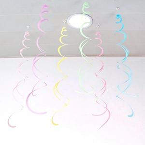 Close-up of colorful PVC spiral hanging decorations in pink, yellow, green, and blue