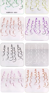 Close-up of PVC spiral streamers in vibrant electroplated colors for party wall decoration