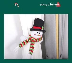 Christmas snowman curtain tieback with black hat and red striped scarf detail