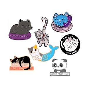 Collection of creative cat and panda enamel pins featuring humorous puns and cute animals