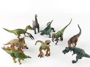 Flat lay of realistic dinosaur toy set showing detailed textures and vibrant colors