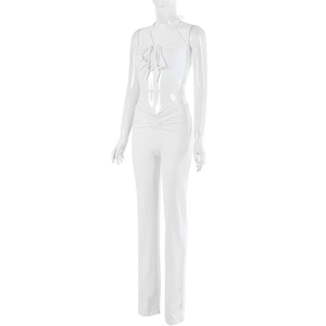 Detailed view of white backless halter top and drawstring pants set with ruched fabric