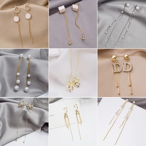 Elegant tassel earrings set with s925 silver needles, pearls and crystal floral designs