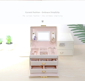 Three-layer PU leather jewelry box detail showing inner mirror and drawer compartments