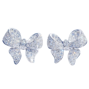 Luxurious bow earrings with micro-paved sparkling cubic zirconia in silver finish