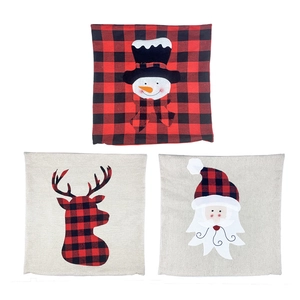 Three Christmas pillow covers featuring snowman reindeer and Santa on red black buffalo plaid