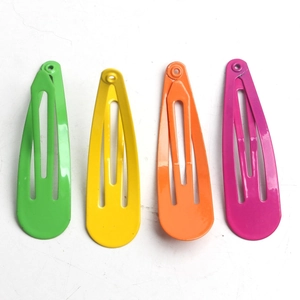 Set of four colorful 5cm metal snap hair clips in green, yellow, orange and pink tones