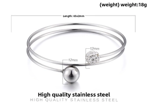 Detail of high quality stainless steel double layer open bangle with crystal and steel beads