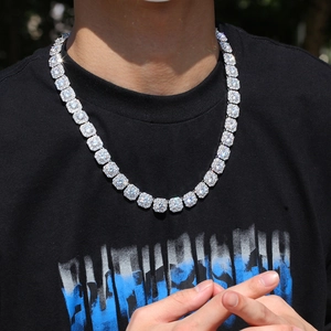 Close-up of men's hip hop silver chain with square zircon links on neck