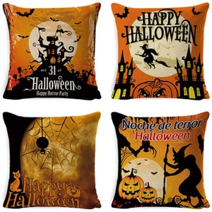 Detail showing a set of four Halloween pillow covers with pumpkin and spider motifs