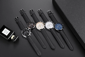 Macro detail of quartz men's watches with Roman numerals and three-eye dial design