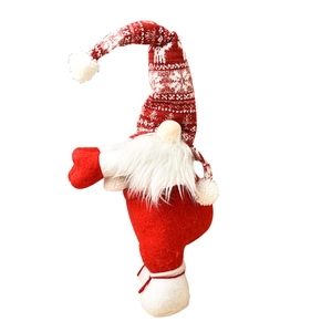 Christmas gnome curtain tieback with red knitted hat and long white beard on white background