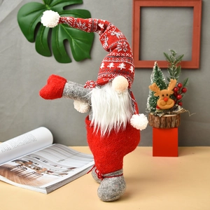 Festive Christmas gnome doll decoration with red knitted hat and long white beard for curtains