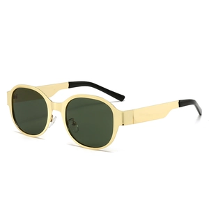 Vintage oversized round metal sunglasses in gold finish with dark tinted lenses