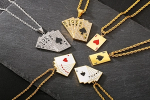 Detail of hip hop poker pendants with gold and silver plating and zircon stones