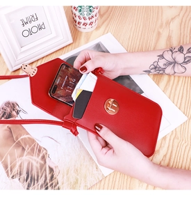 Detail of red PU leather crossbody phone bag showing interior card slots and lock