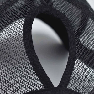 Detail of breathable black mesh baseball cap featuring a reinforced ponytail opening