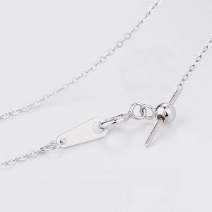 Macro view of adjustable silver stainless steel chain with pin slider and silicone bead