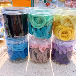 Set of 50 seamless high-elastic hair ties in various candy colors and storage jars