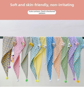 Detail of colorful cotton plaid baby triangle scarves with cute plush cartoon animals