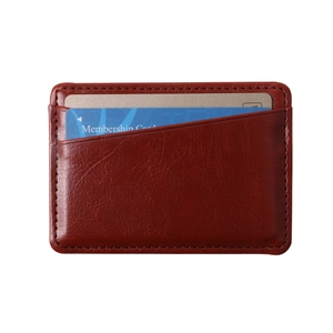 Minimalist brown PU leather card holder wallet with visible stitching on white background