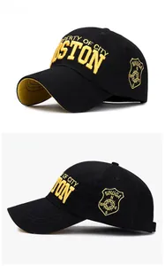 Detailed close-up of city Boston 3D embroidery on a black cotton baseball cap