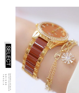 Close-up of women's gold watch and sunflower bracelet set featuring crystal bezel