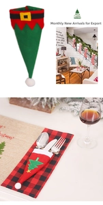 Détail du porte-couverts de Noël avec broderie sur tissu festif rouge et vert