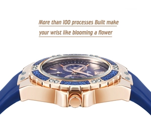 Detail of rose gold case with rhinestone bezel and blue silicone strap for ladies watch