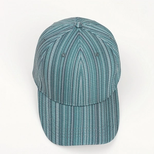 Top-down view of six-panel baseball cap with blue-grey vertical stripes and top ventilation