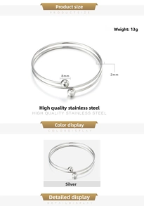 Detail of silver stainless steel double-loop bangle with 8mm beads and 2mm wire diameter