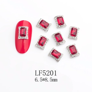 Detailed view of 6.5*8.5mm emerald cut dark red nail rhinestones with alloy base