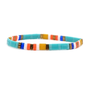 Colorful Tila bead stretch bracelet with bohemian multi-color tile patterns and gold accents