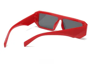 Detail view of red square sunglasses frames showing inner arm measurements and hinge