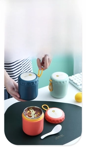 Three 304 stainless steel insulated food jars in navy, mint, and coral with lids and spoons