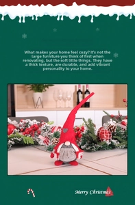 Detailaufnahme von Weihnachtsgnom-Plüschtier mit roter Mütze und grauem Herzdetail