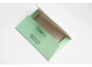 Detail of light green silver polishing cloth envelope measuring approx 10 x 7cm