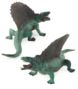Detailed view of two green Dimetrodon dinosaur toy figures with realistic skin texture