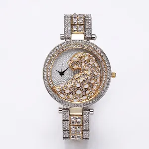 Luxury women's quartz watch with leopard head dial and diamond-set two-tone steel band