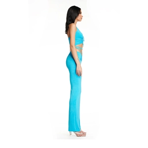Side view of blue deep V-neck halter top and high-waisted flare pants set for women