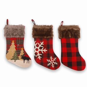 Set of 3 plaid Christmas stockings with faux fur cuffs and reindeer snowflake appliques